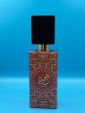 Lattafa Ajwad pink-gold luxury perfume bottle