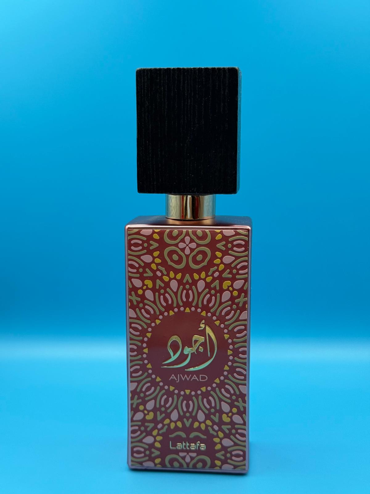 Lattafa Ajwad pink-gold luxury perfume bottle