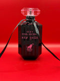 Proud Black Orchid textured black bottle